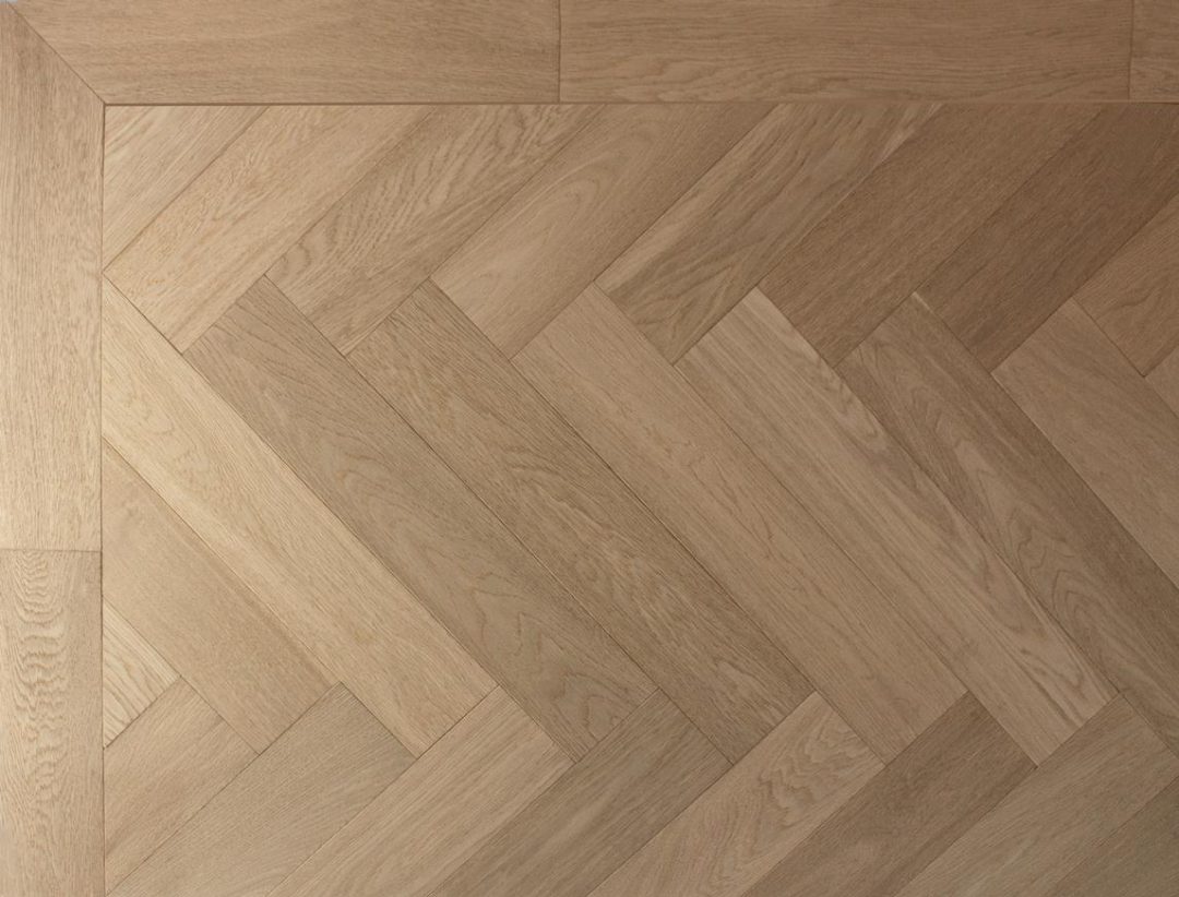 Pale Oak Herringbone Istoria Bespoke Engineered Wood Flooring by Jordan Andrews