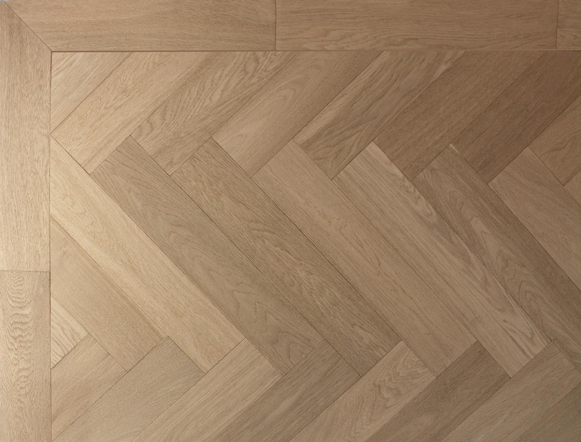 Pale Oak Herringbone Istoria Bespoke Engineered Wood Flooring by Jordan Andrews